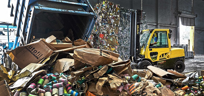 Hyster lowers handling costs for paper recyclers.