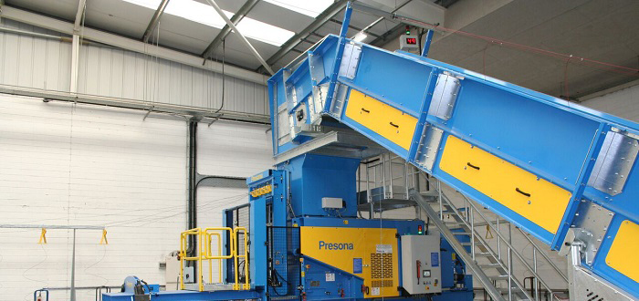 Heron Foods installs Presona baler and conveyor system.